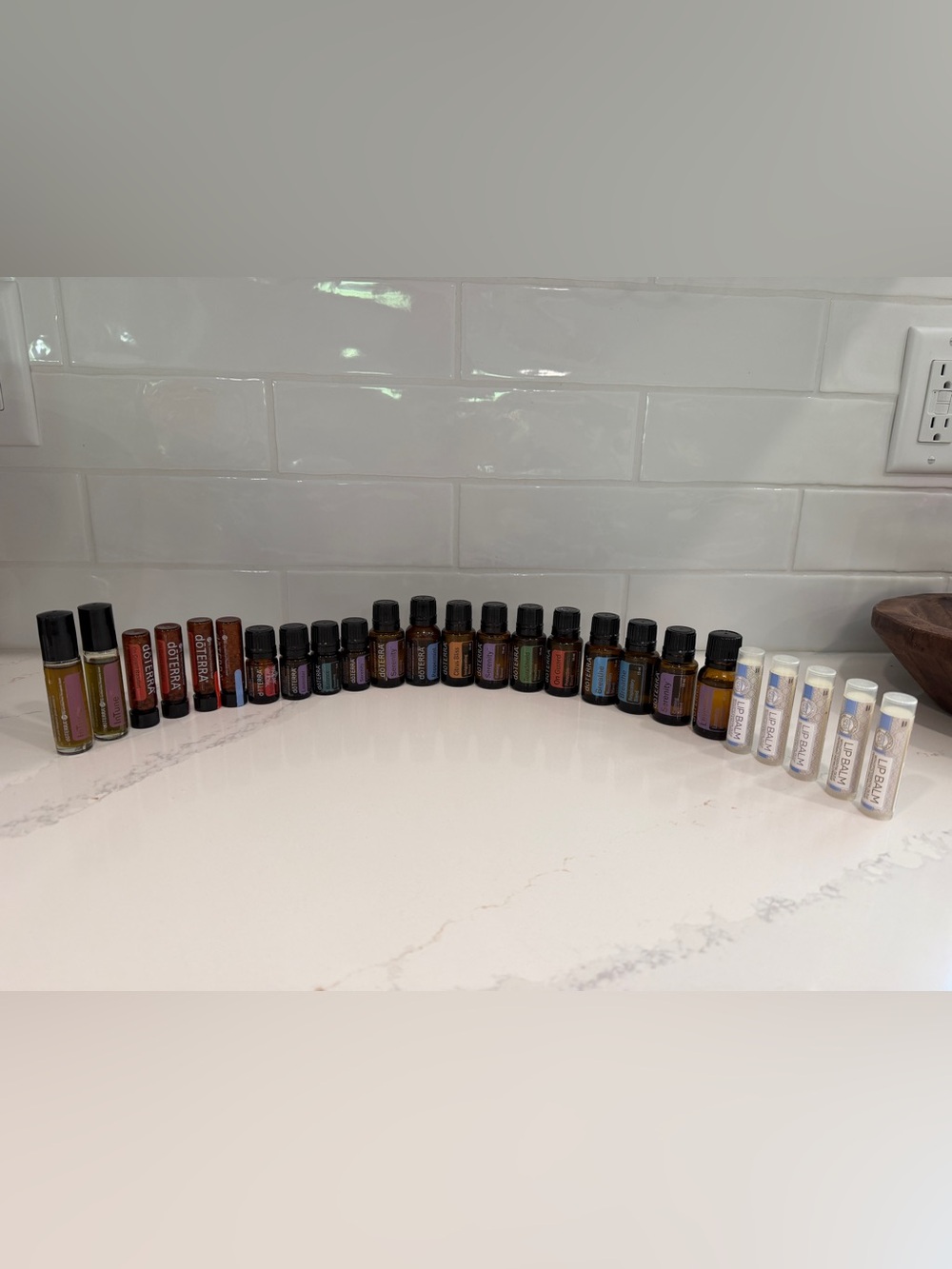 doTERRA brand essential oils, lip balms, beadlets, and roll ons